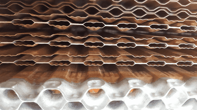 Cut radiator core sample. (Fig. A)